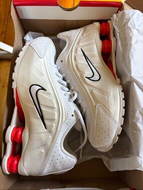 Nike White Sneakers with Black Swoosh and Red Shox